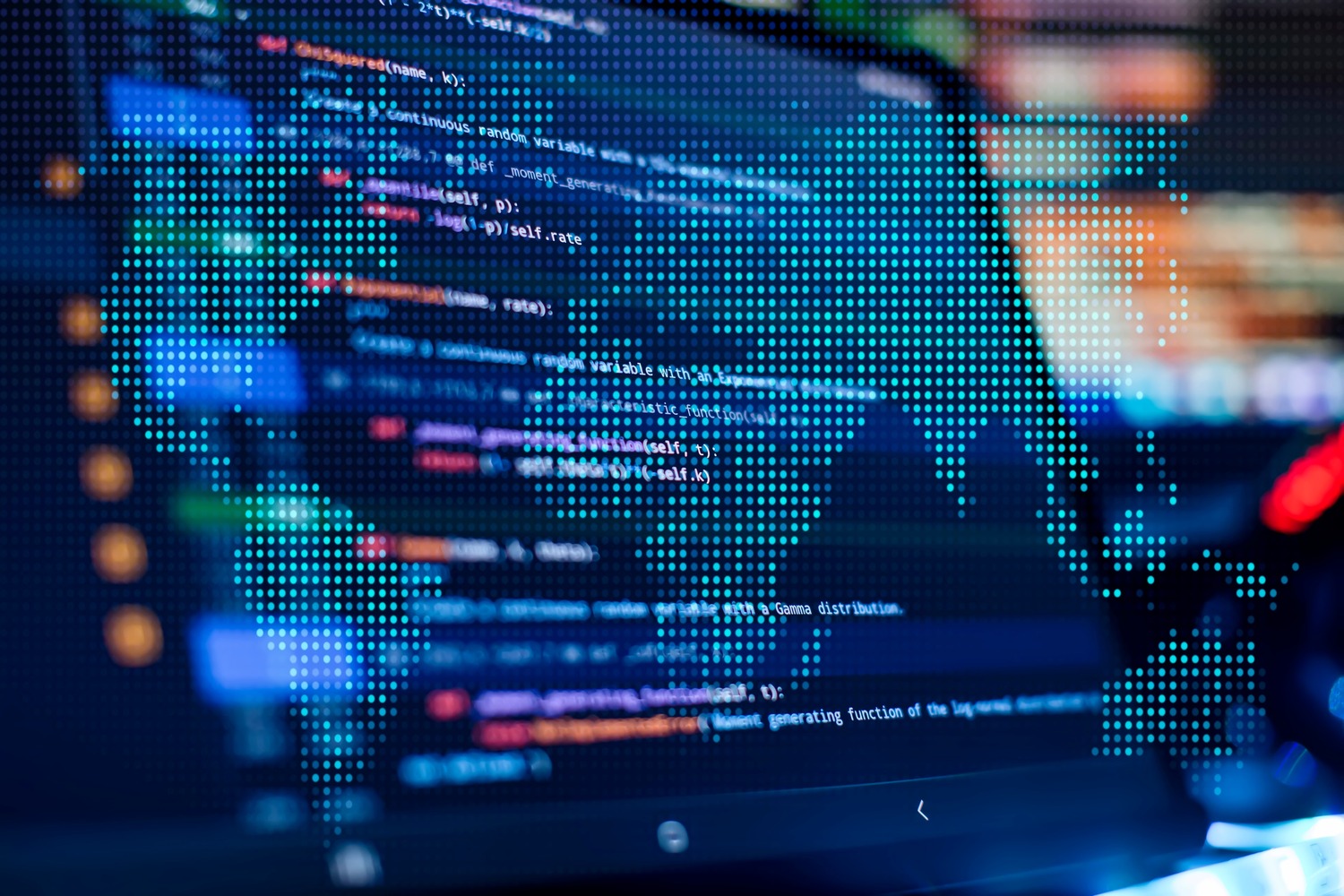 A computer screen displays lines of colorful programming code, with a translucent digital map of the world overlaid on top.