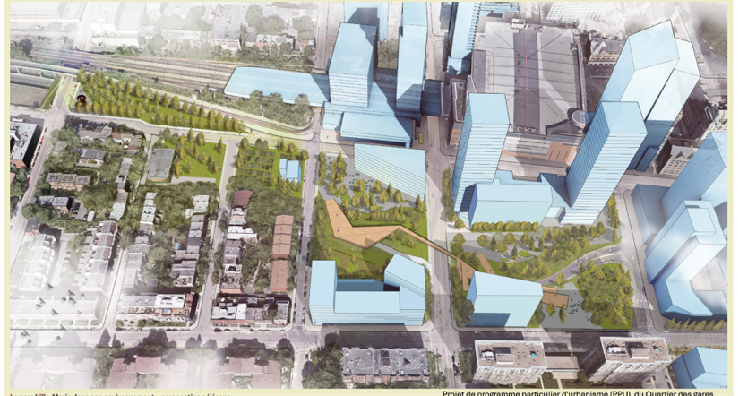 Aerial view of an urban development plan showing high-rise buildings, green spaces, pathways, and residential neighborhoods.